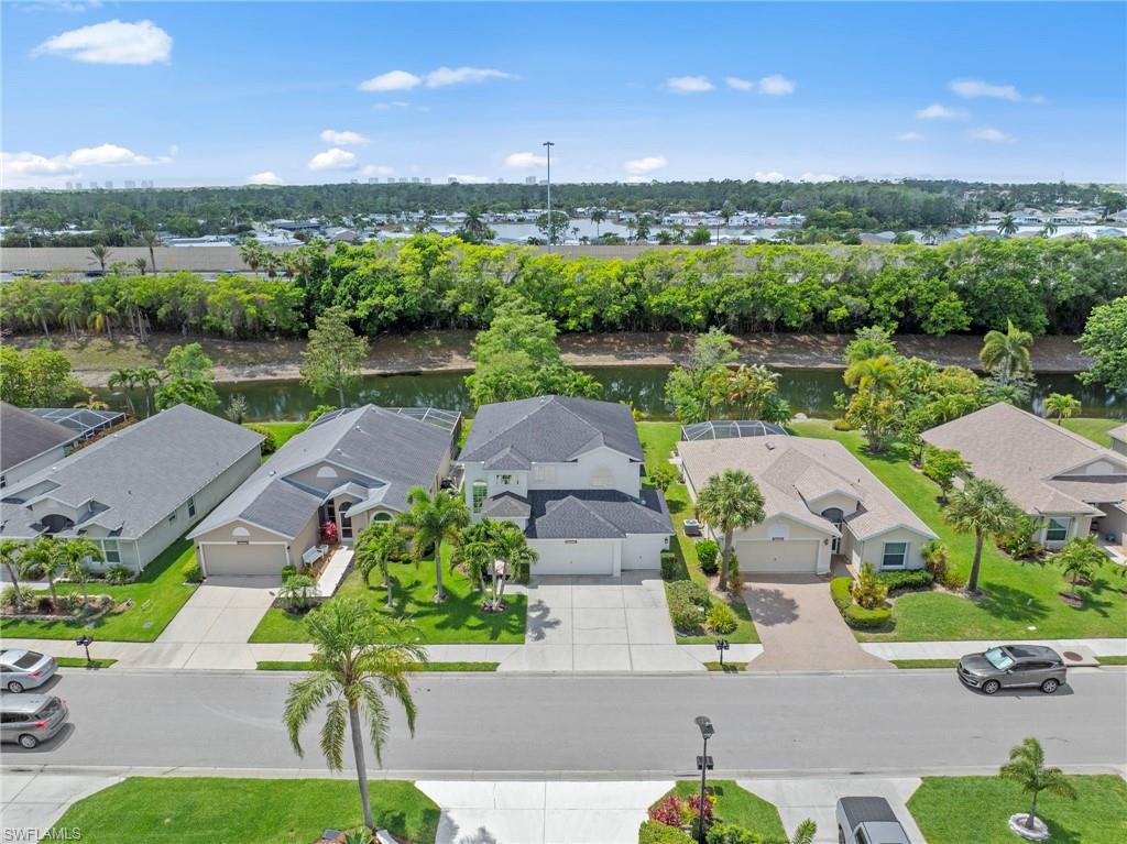 21632 Windham Run Estero, FL 33928 - Photo 37 of 50 an aerial view of a house with garden space and lake view