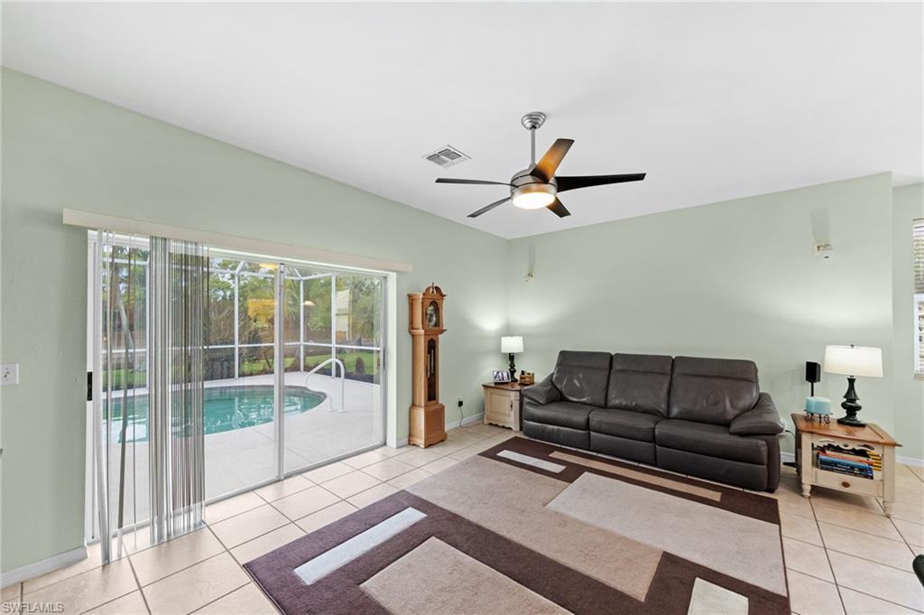 21632 Windham Run Estero, FL 33928 - Photo 7 of 50 a living room with furniture