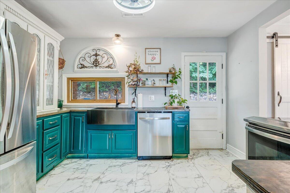 731 Eddies Road Salem, VA 24153 - Photo 14 of 48 Bright kitchen with backyard access