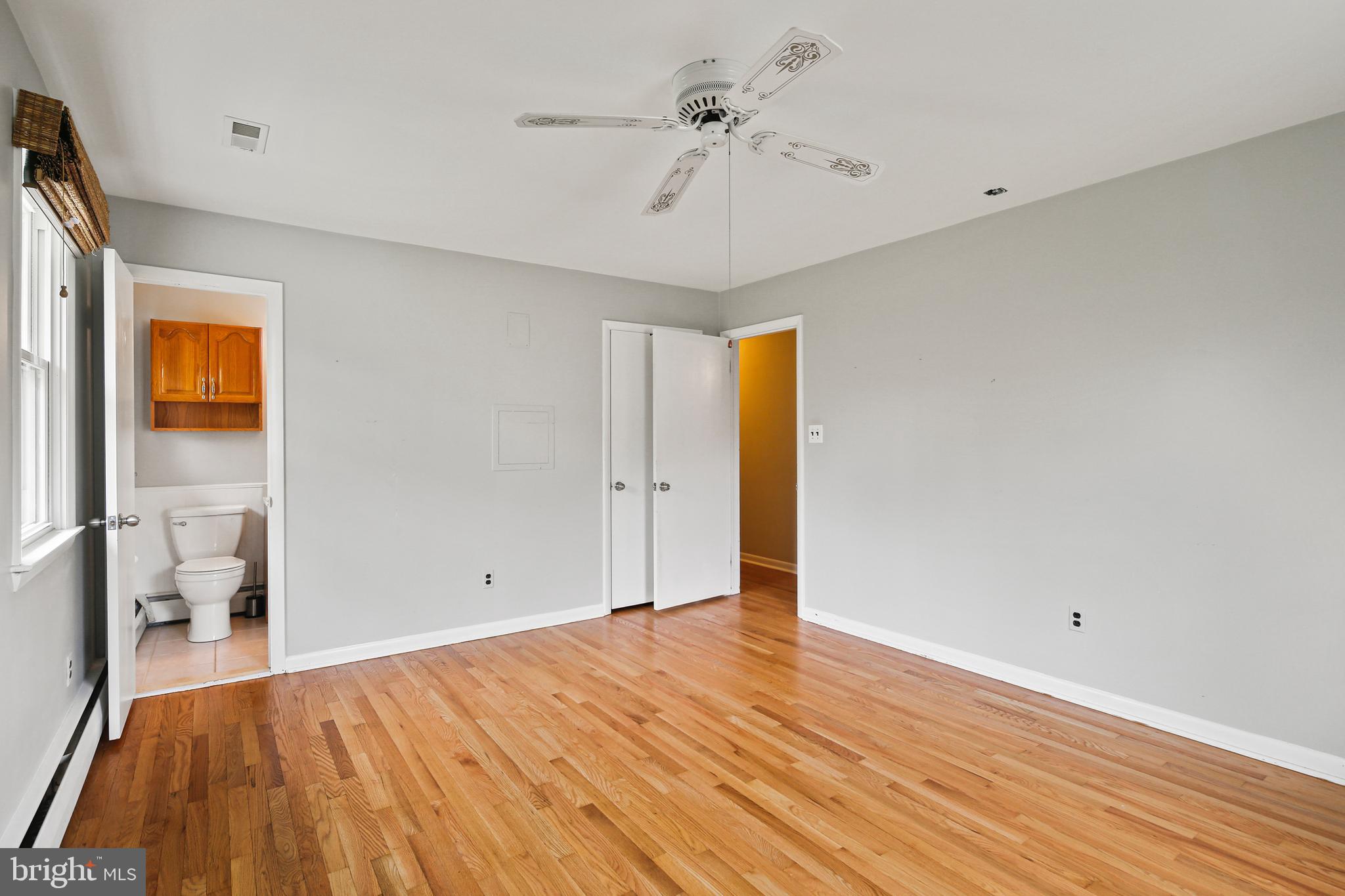 9826 Fox Hill Road Perry Hall, MD 21128 - Photo 14 of 45 a view of empty room with wooden floor
