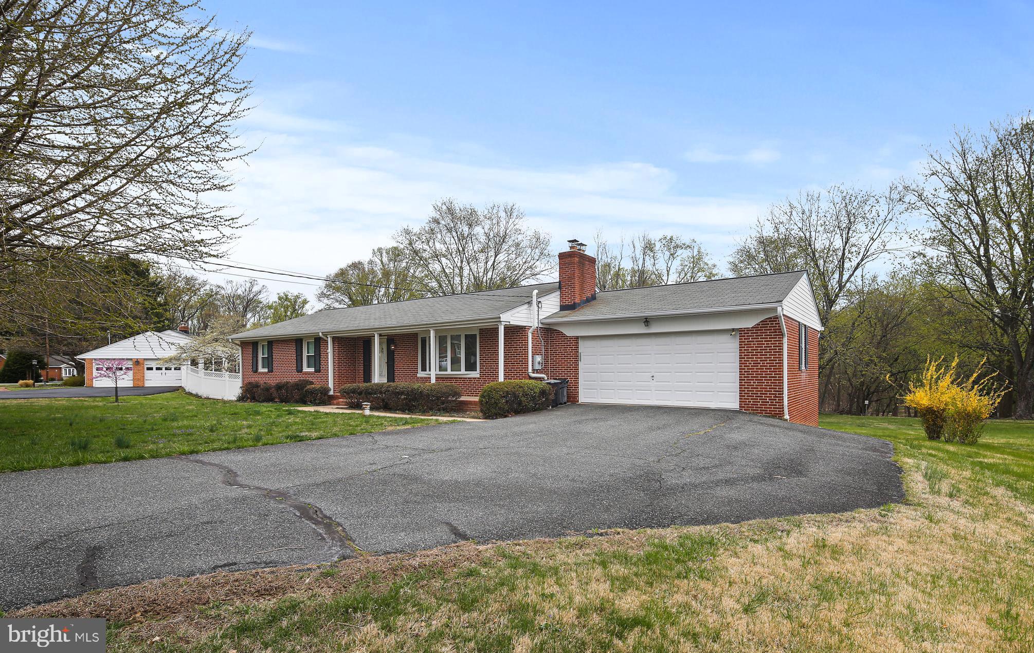 9826 Fox Hill Road Perry Hall, MD 21128 - Photo 45 of 45 a view of a yard in front of a house with large trees