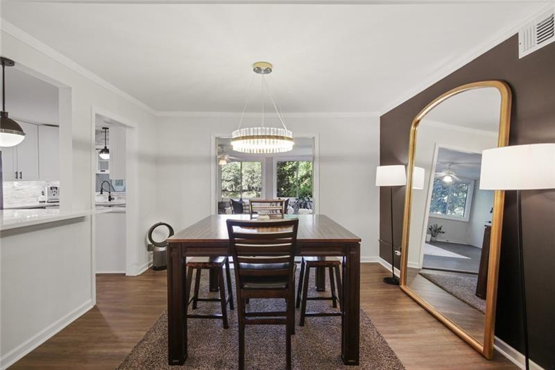 162 Elysian Way Northwest Atlanta, GA 30327 - Photo 13 of 32 a view of a dining room with furniture and window
