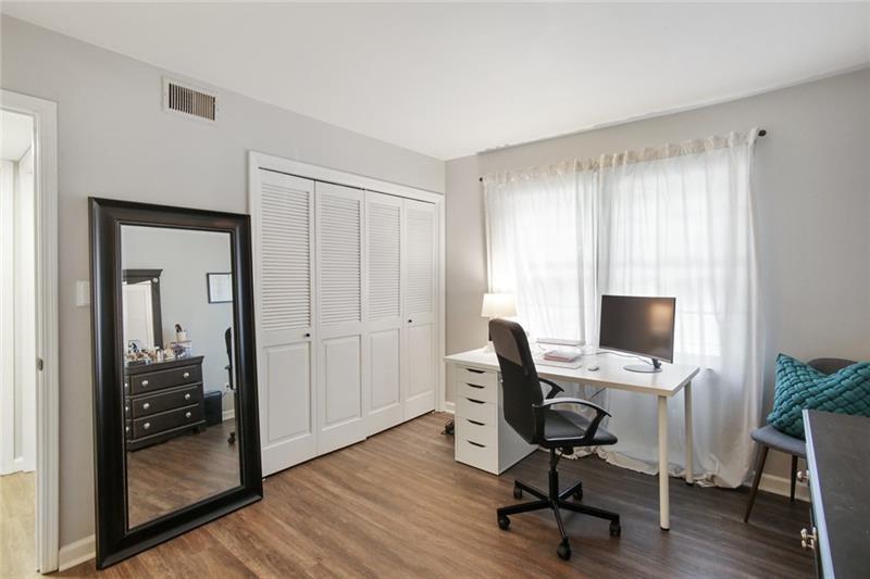 162 Elysian Way Northwest Atlanta, GA 30327 - Photo 23 of 32 a view of a workspace with furniture and a window