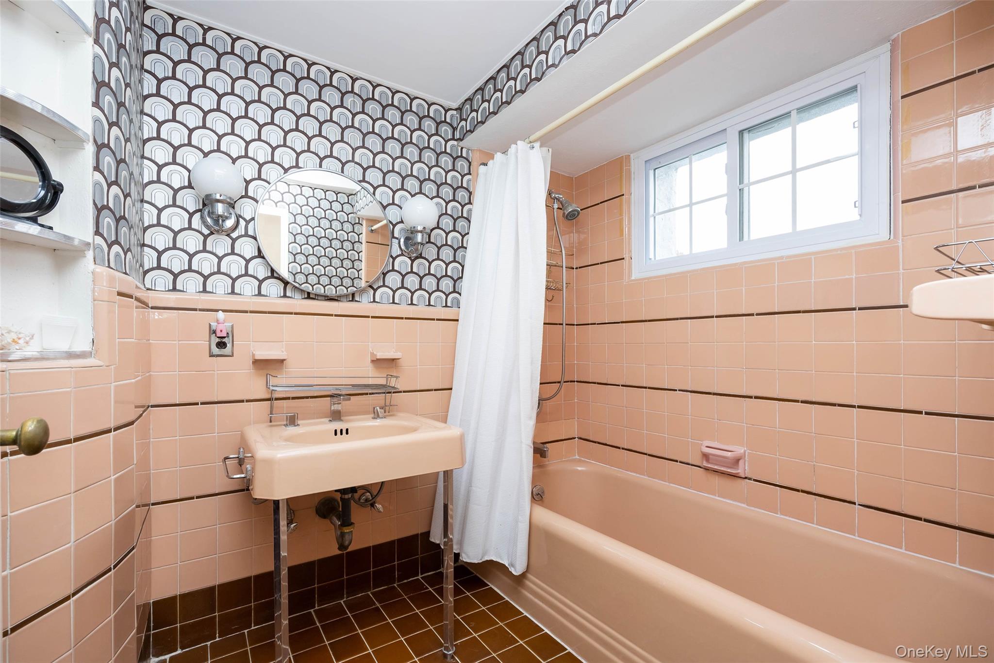 65 Old Mill Road Manhasset, NY 11030 - Photo 13 of 17 a bathroom with a sink and a bathtub