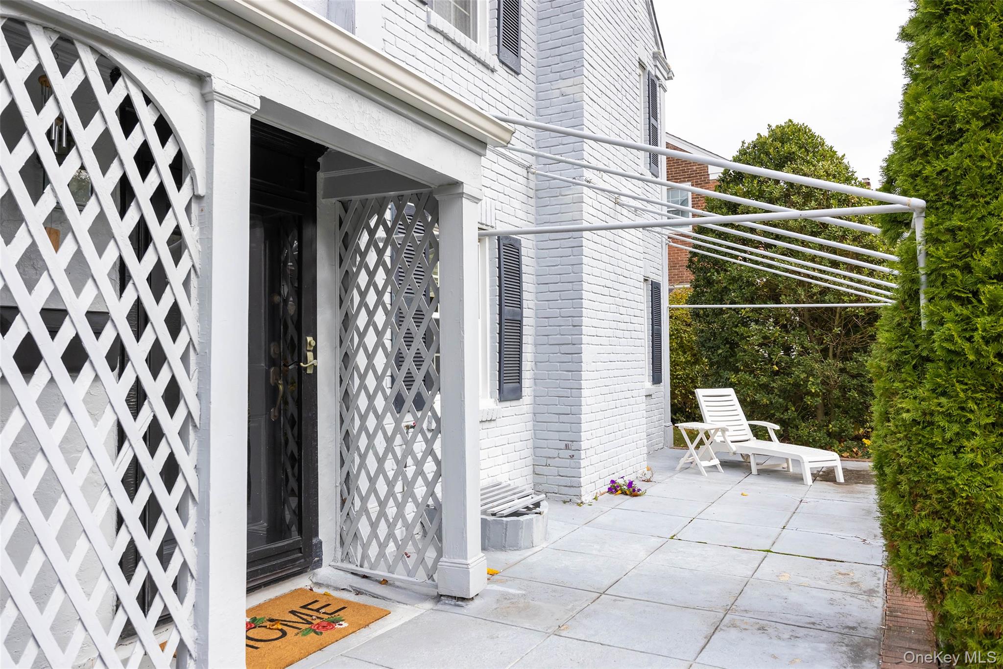 65 Old Mill Road Manhasset, NY 11030 - Photo 3 of 17 a view of entryway with patio