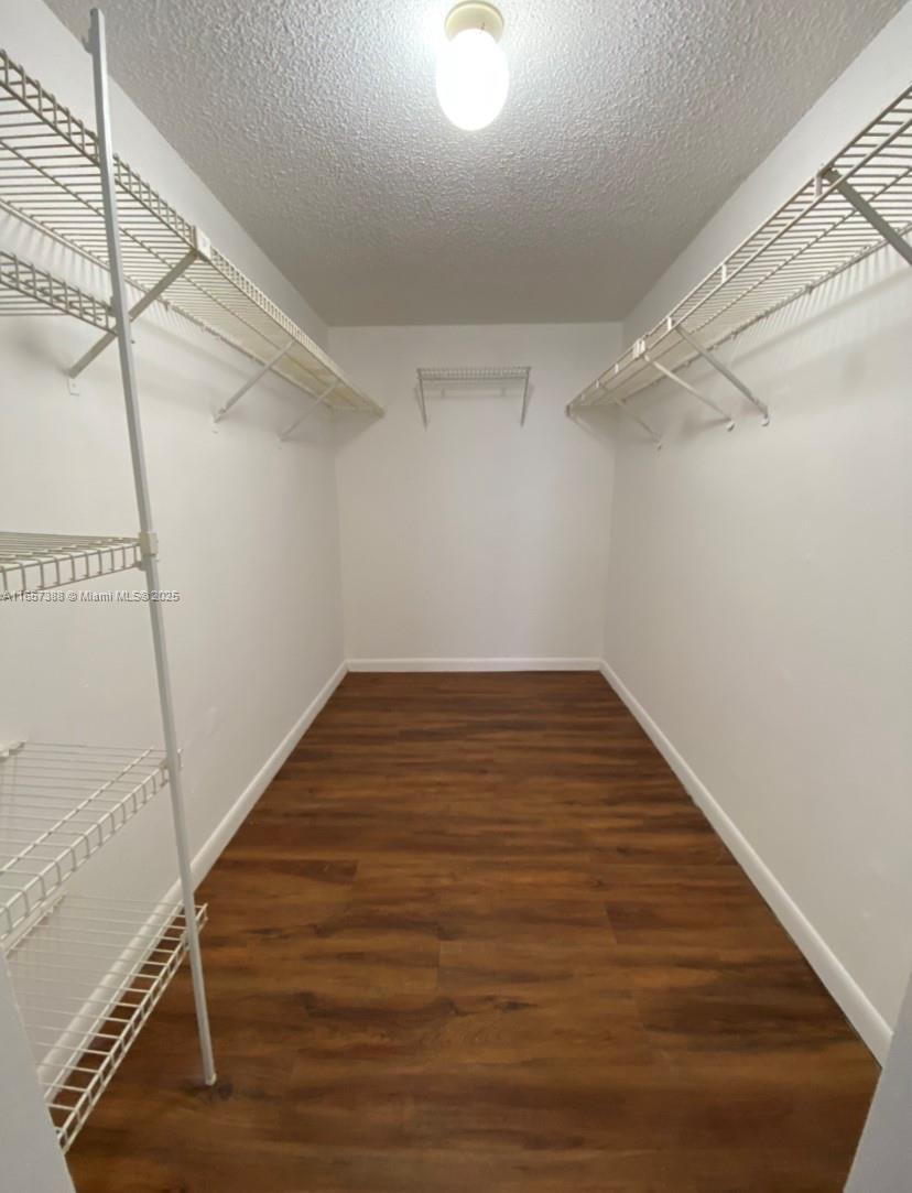 13499 Biscayne Boulevard, Unit 1507 North Miami, FL 33181 - Photo 21 of 32 a view of a room with wooden floor