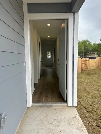 a view of a hallway with a fountain