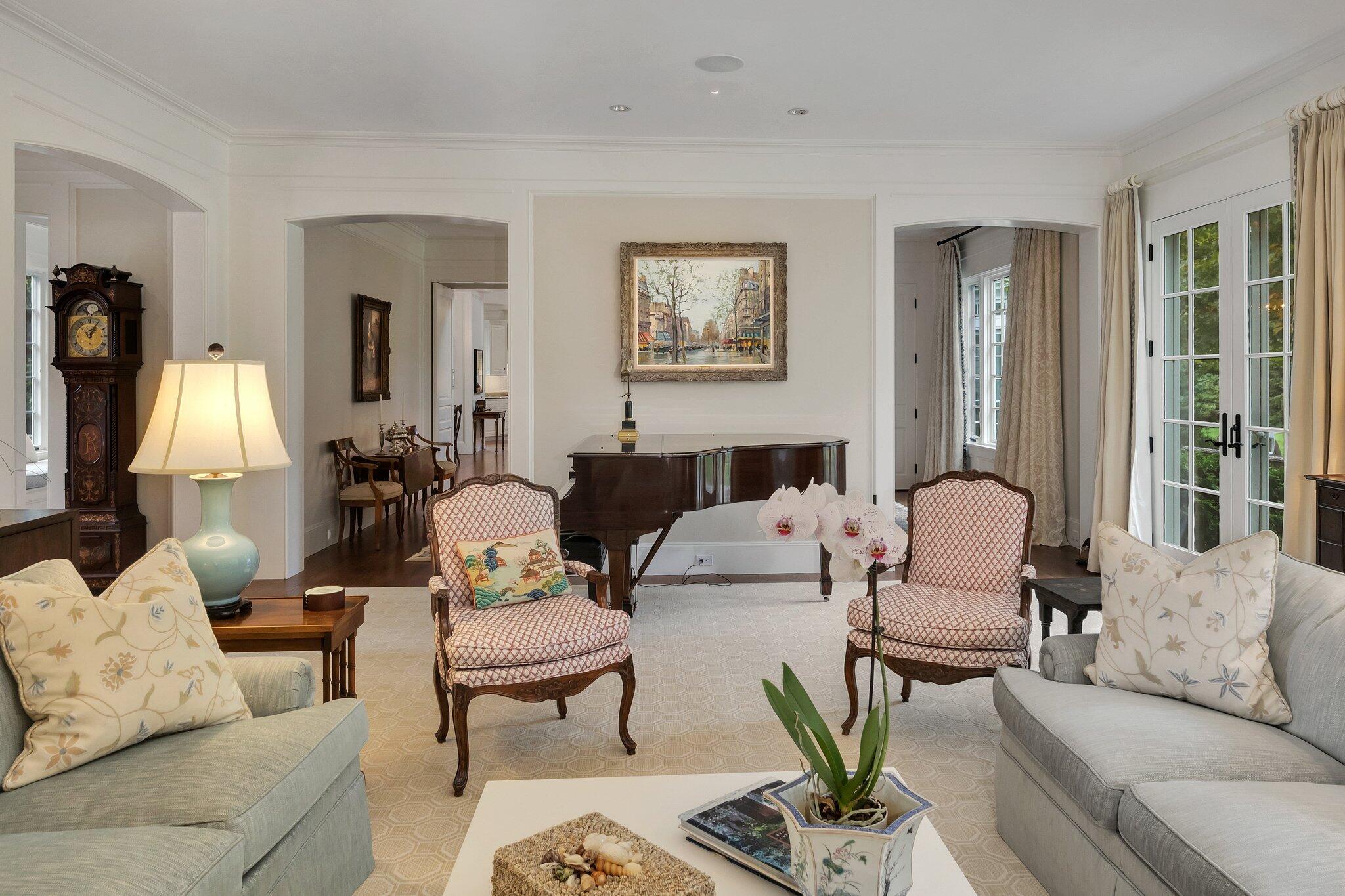 345 Windswept Way Osterville, MA 02655 - Photo 13 of 66 a living room with furniture fireplace and a table