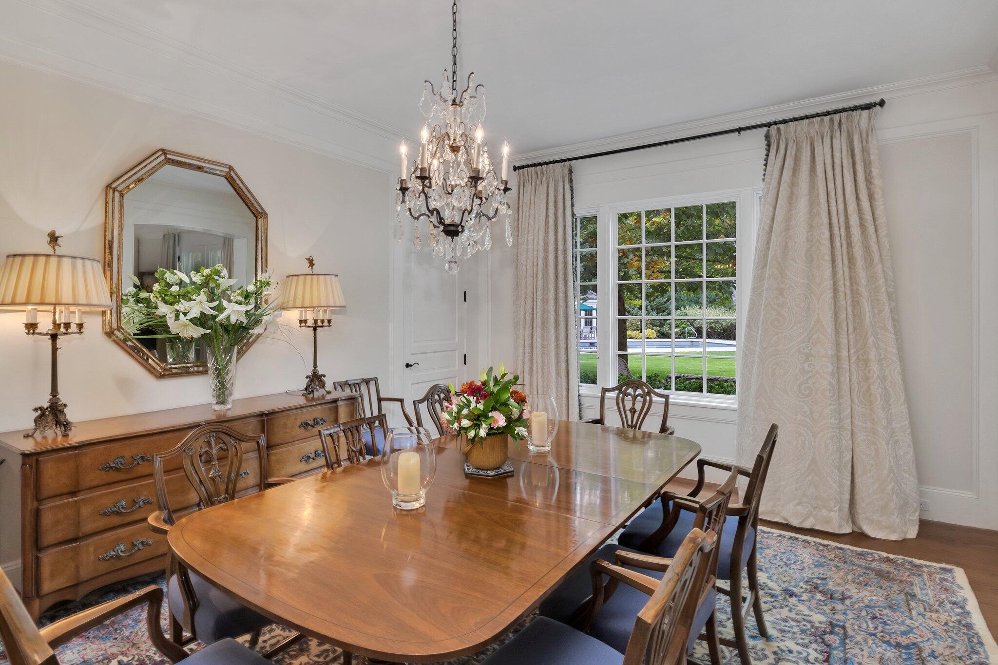 345 Windswept Way Osterville, MA 02655 - Photo 29 of 66 a dining room with furniture potted plants and wooden floor