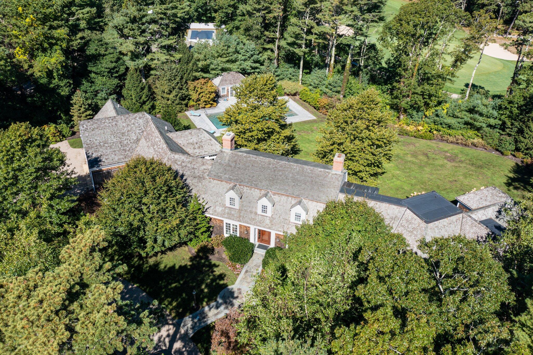 345 Windswept Way Osterville, MA 02655 - Photo 3 of 66 an aerial view of a house with a yard