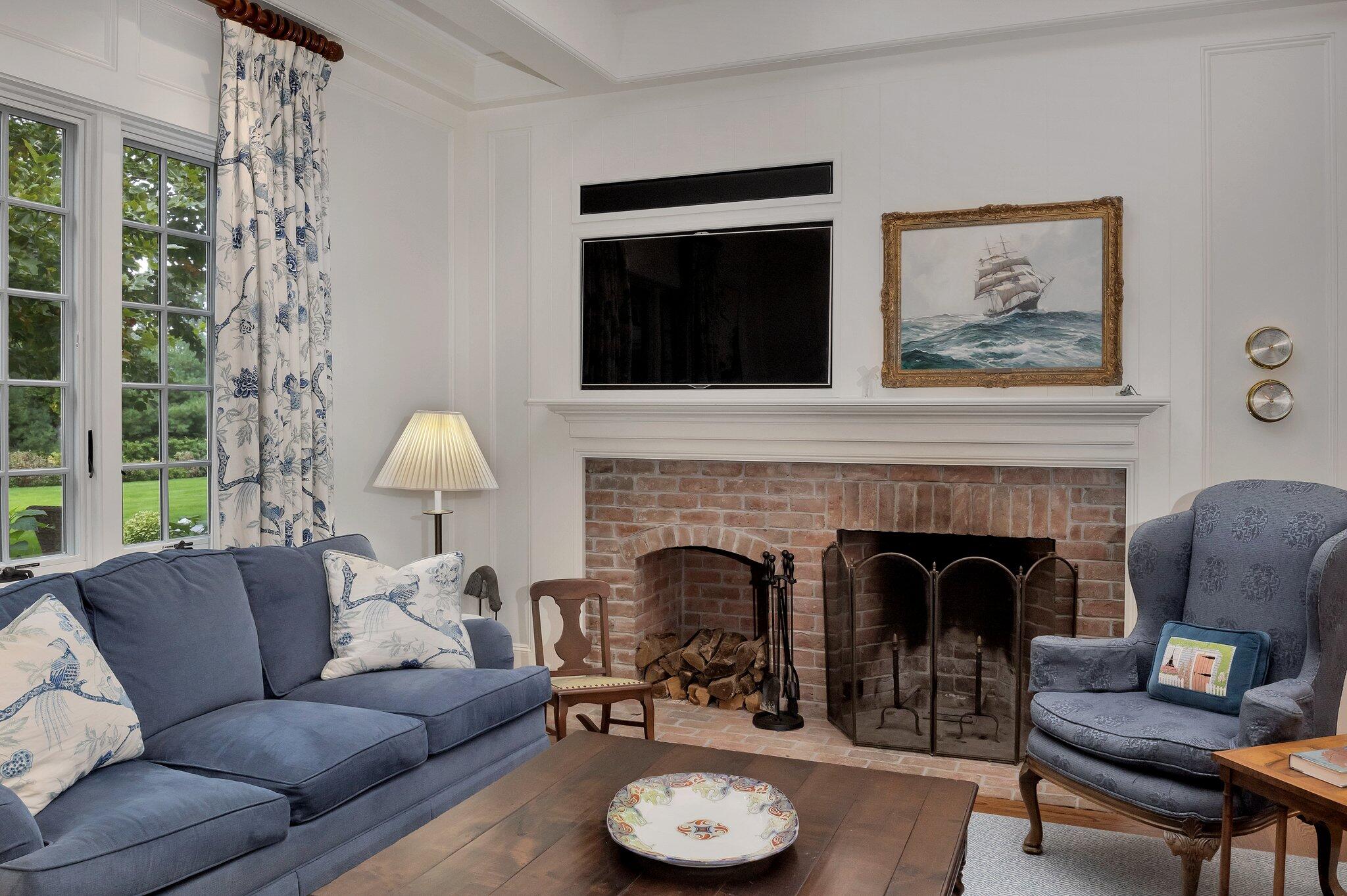 345 Windswept Way Osterville, MA 02655 - Photo 33 of 66 a living room with furniture and a fireplace