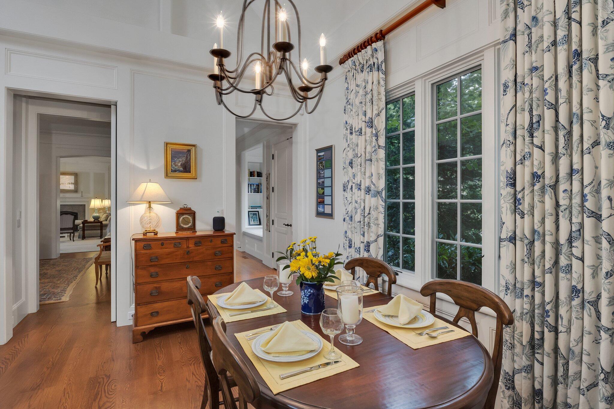 345 Windswept Way Osterville, MA 02655 - Photo 34 of 66 a view of a dining room with furniture a chandelier and wooden floor