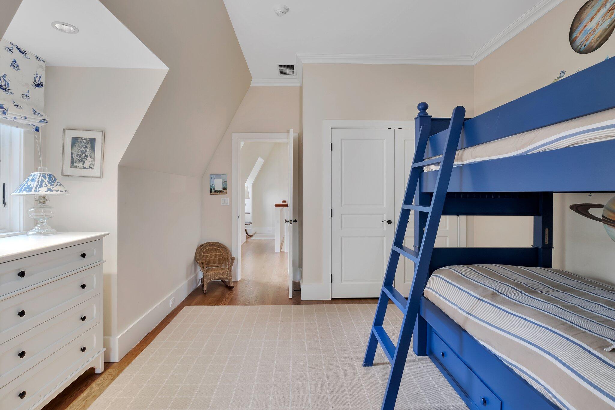 345 Windswept Way Osterville, MA 02655 - Photo 45 of 66 a bedroom with a bed and a table