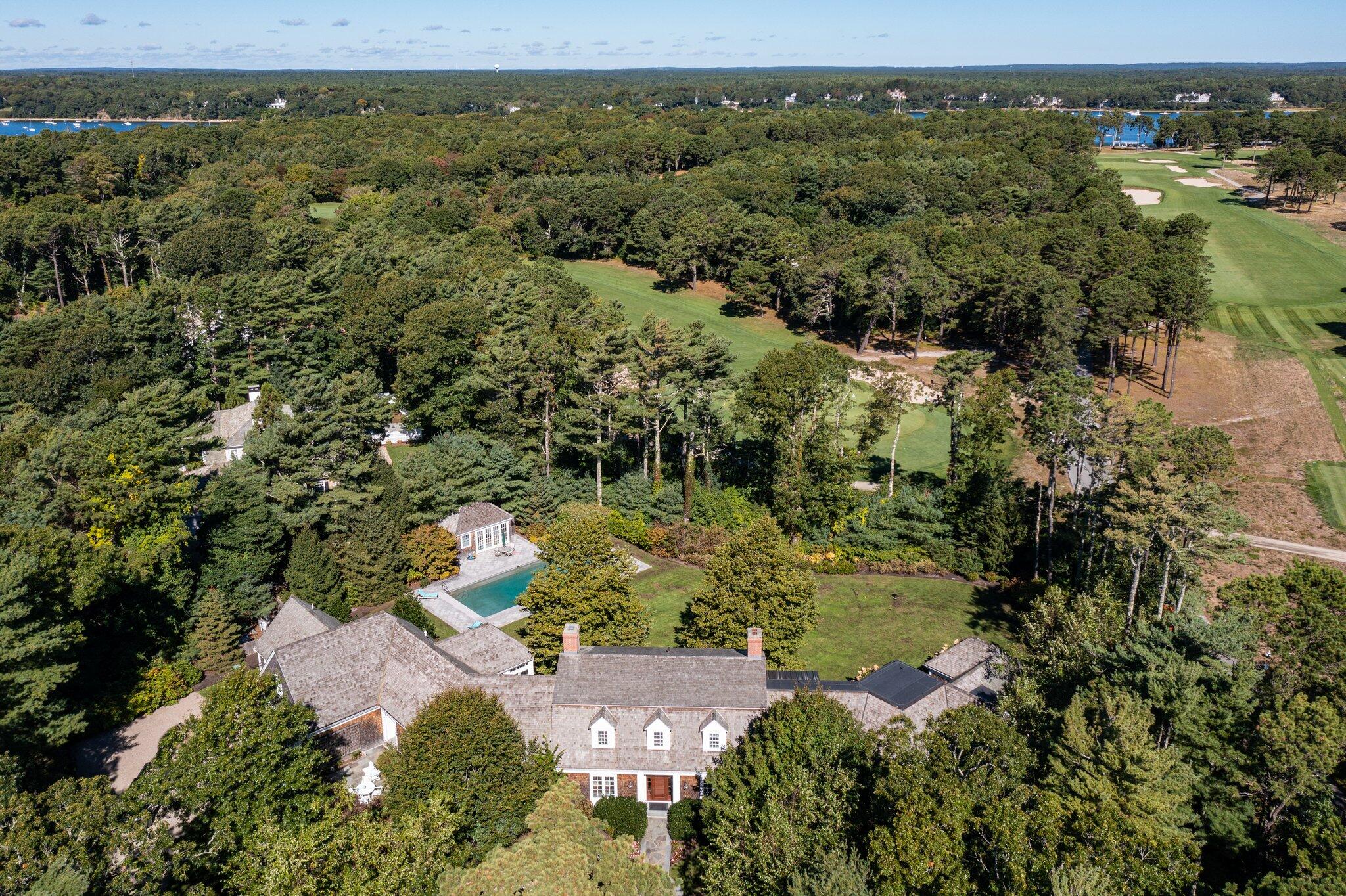 345 Windswept Way Osterville, MA 02655 - Photo 59 of 66 an aerial view of residential houses with outdoor space