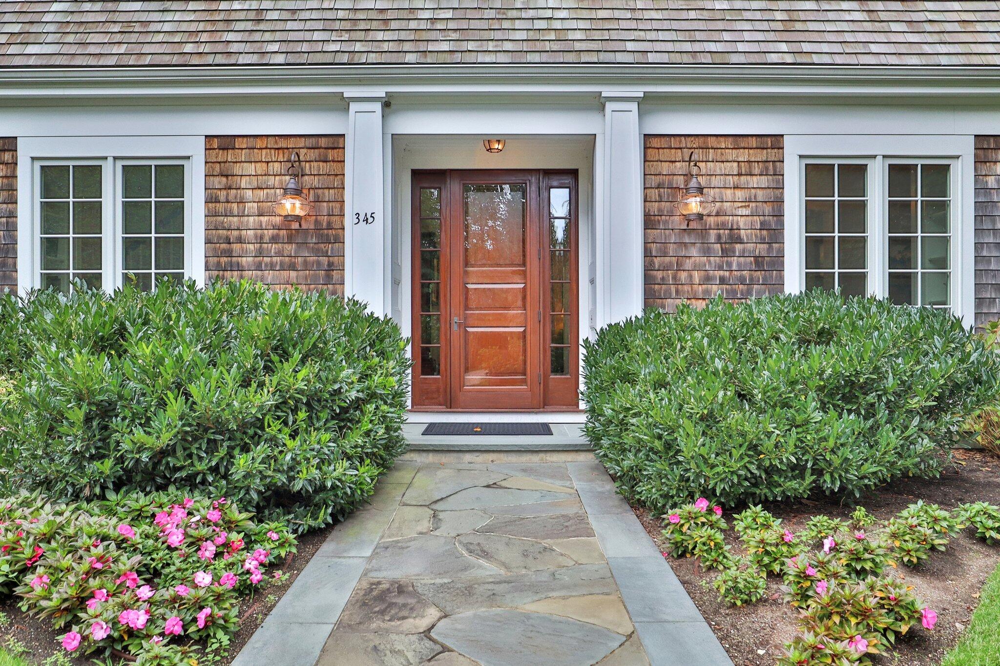 345 Windswept Way Osterville, MA 02655 - Photo 8 of 66 two potted plants in front of a house