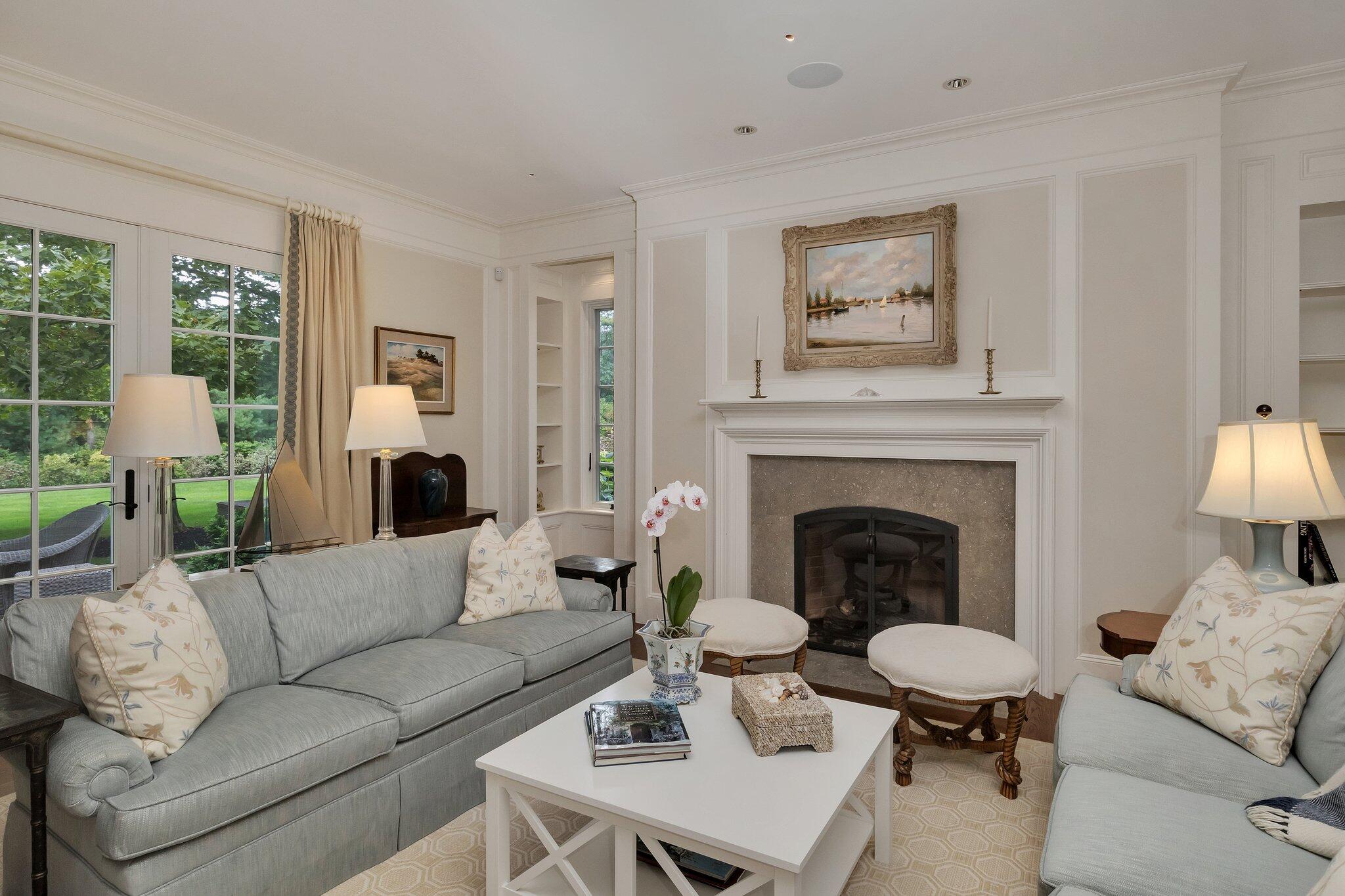 345 Windswept Way Osterville, MA 02655 - Photo 10 of 66 a living room with furniture and a fireplace