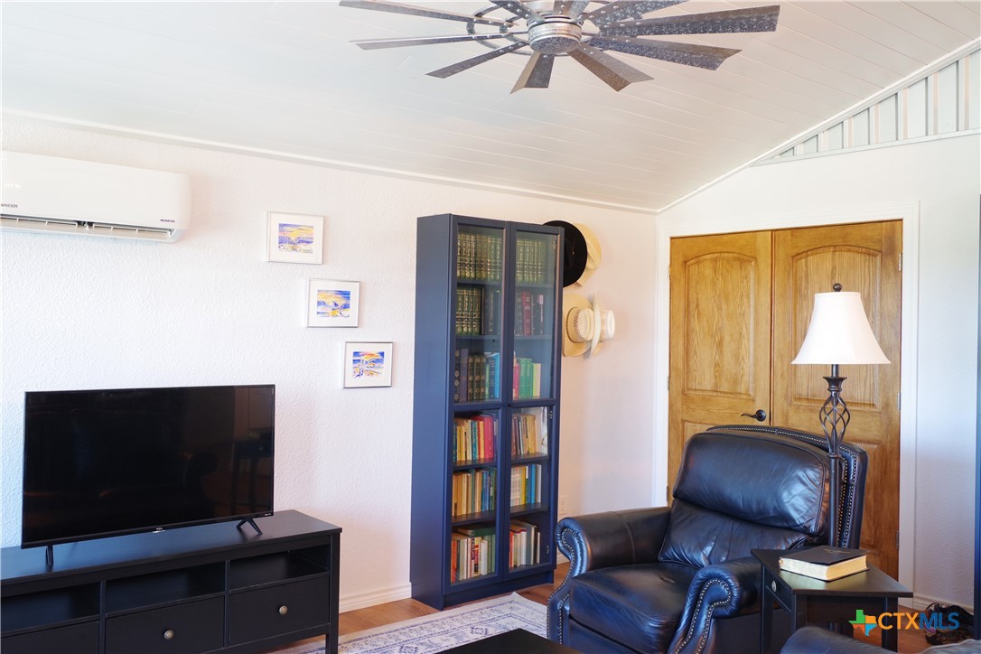 15049 Ranch Road 101 Kempner, TX 76539 - Photo 7 of 25 a living room with furniture and a flat screen tv