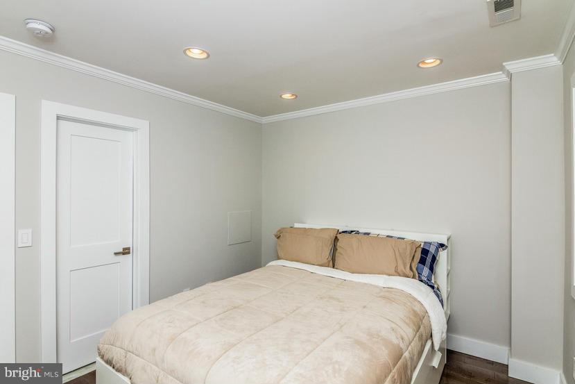 29 17th Street Southeast Washington, DC 20003 - Photo 12 of 30 a bedroom with a bed and a closet