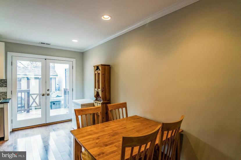 29 17th Street Southeast Washington, DC 20003 - Photo 13 of 30 a view of a dining room with furniture and wooden floor