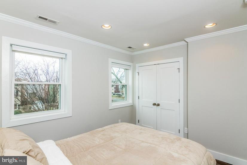 29 17th Street Southeast Washington, DC 20003 - Photo 16 of 30 a bedroom with a bed and a window