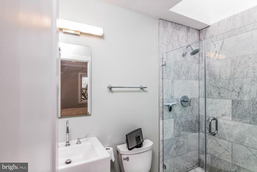 29 17th Street Southeast Washington, DC 20003 - Photo 18 of 30 a bathroom with a sink toilet and shower
