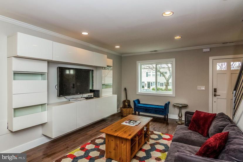 29 17th Street Southeast Washington, DC 20003 - Photo 8 of 30 a living room with furniture and a flat screen tv
