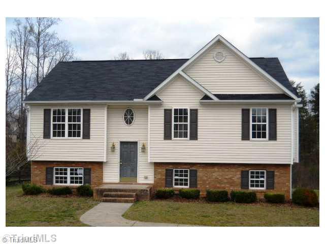 6918 Channel Forest Road Belews Creek, NC 27009 - Photo 1 of 15 Exterior Front.
