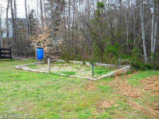 6918 Channel Forest Road Belews Creek, NC 27009 - Photo 7 of 15 Yard/Garden.