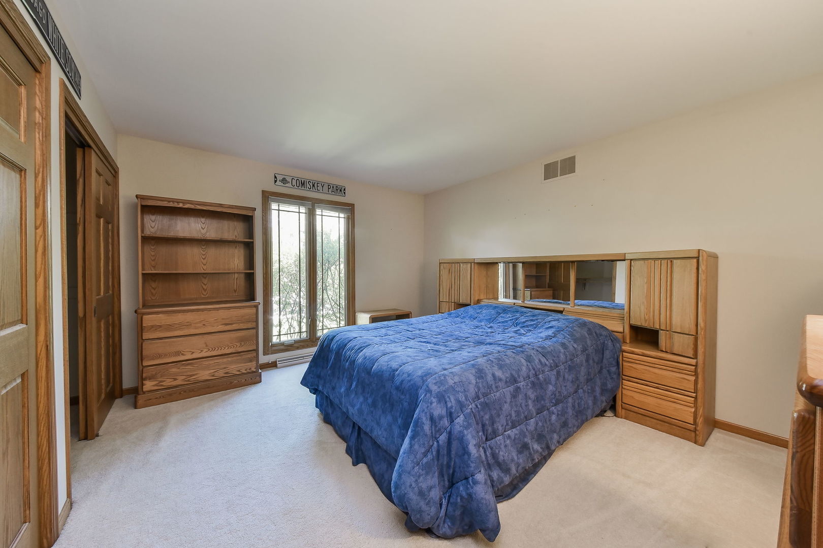 8S526 River Drive Naperville, IL 60565 - Photo 13 of 35 a bedroom with a bed and a closet