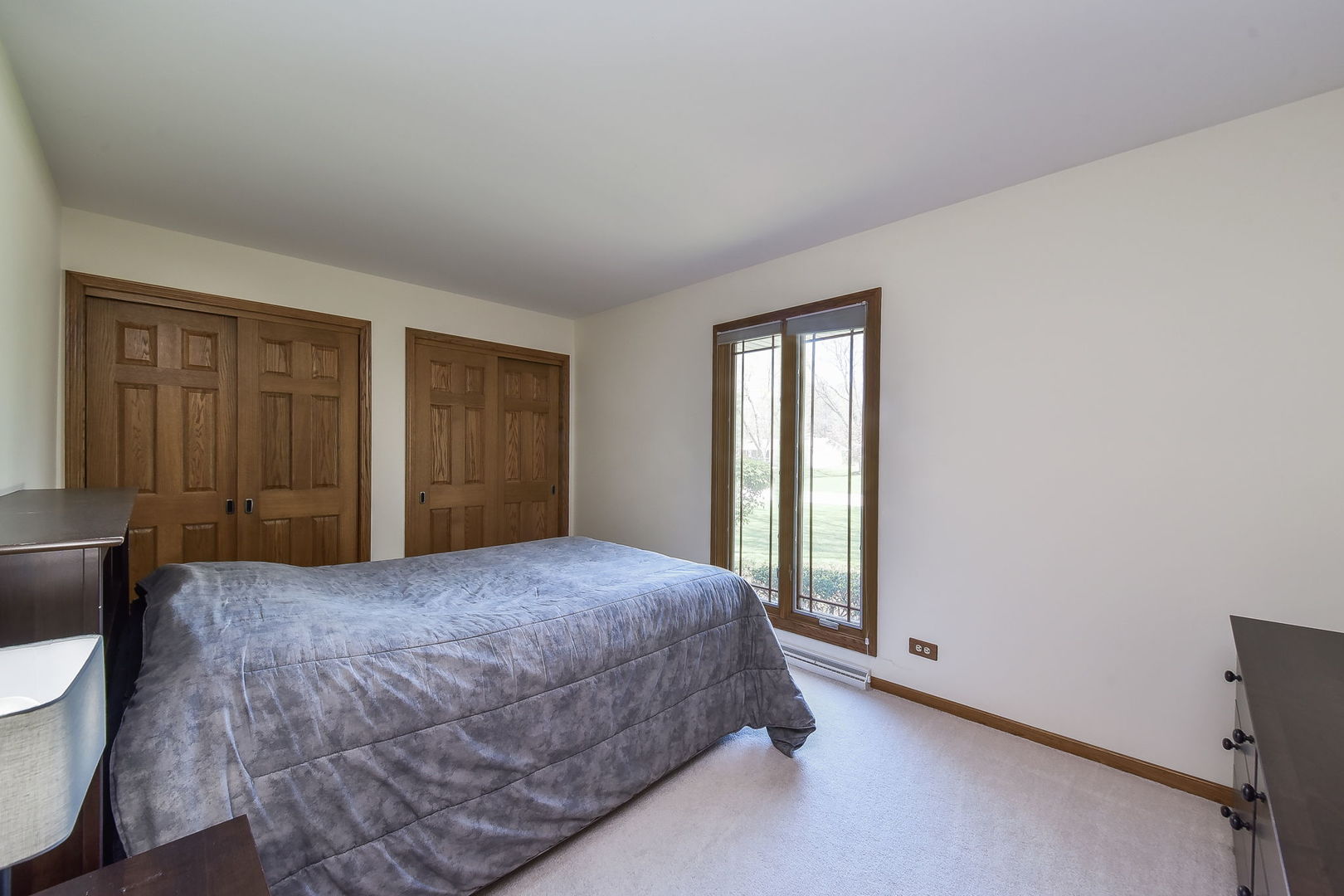 8S526 River Drive Naperville, IL 60565 - Photo 14 of 35 a bedroom with a bed and a window