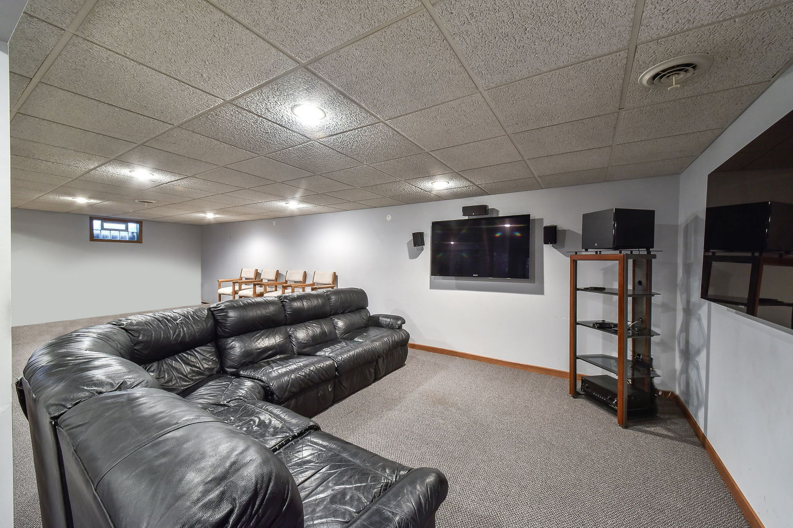 8S526 River Drive Naperville, IL 60565 - Photo 20 of 35 a living room with furniture and a flat screen tv