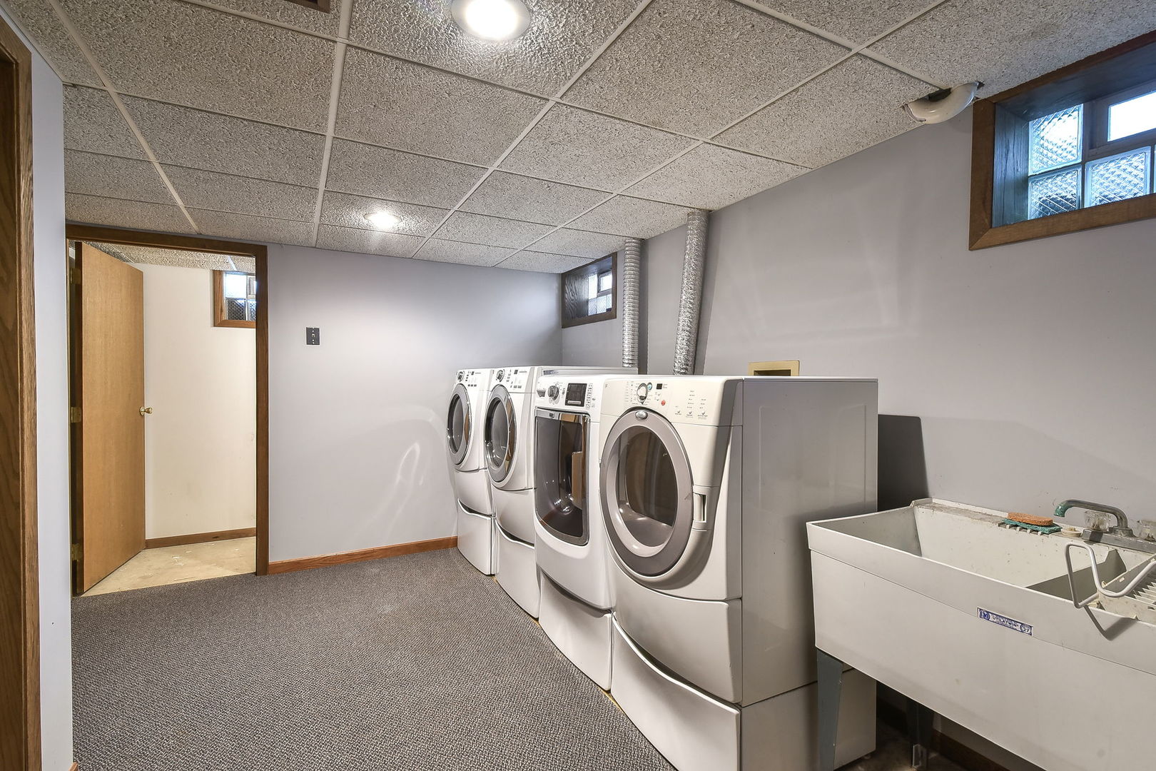 8S526 River Drive Naperville, IL 60565 - Photo 23 of 35 a utility room with dryer and washer