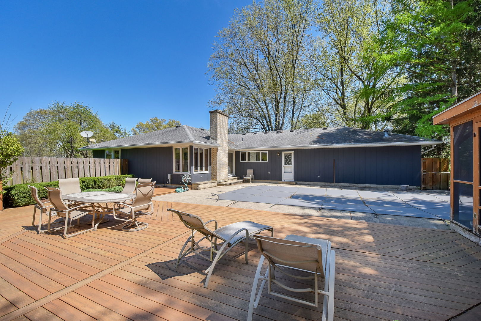 8S526 River Drive Naperville, IL 60565 - Photo 29 of 35 a view of a house with swimming pool and sitting area