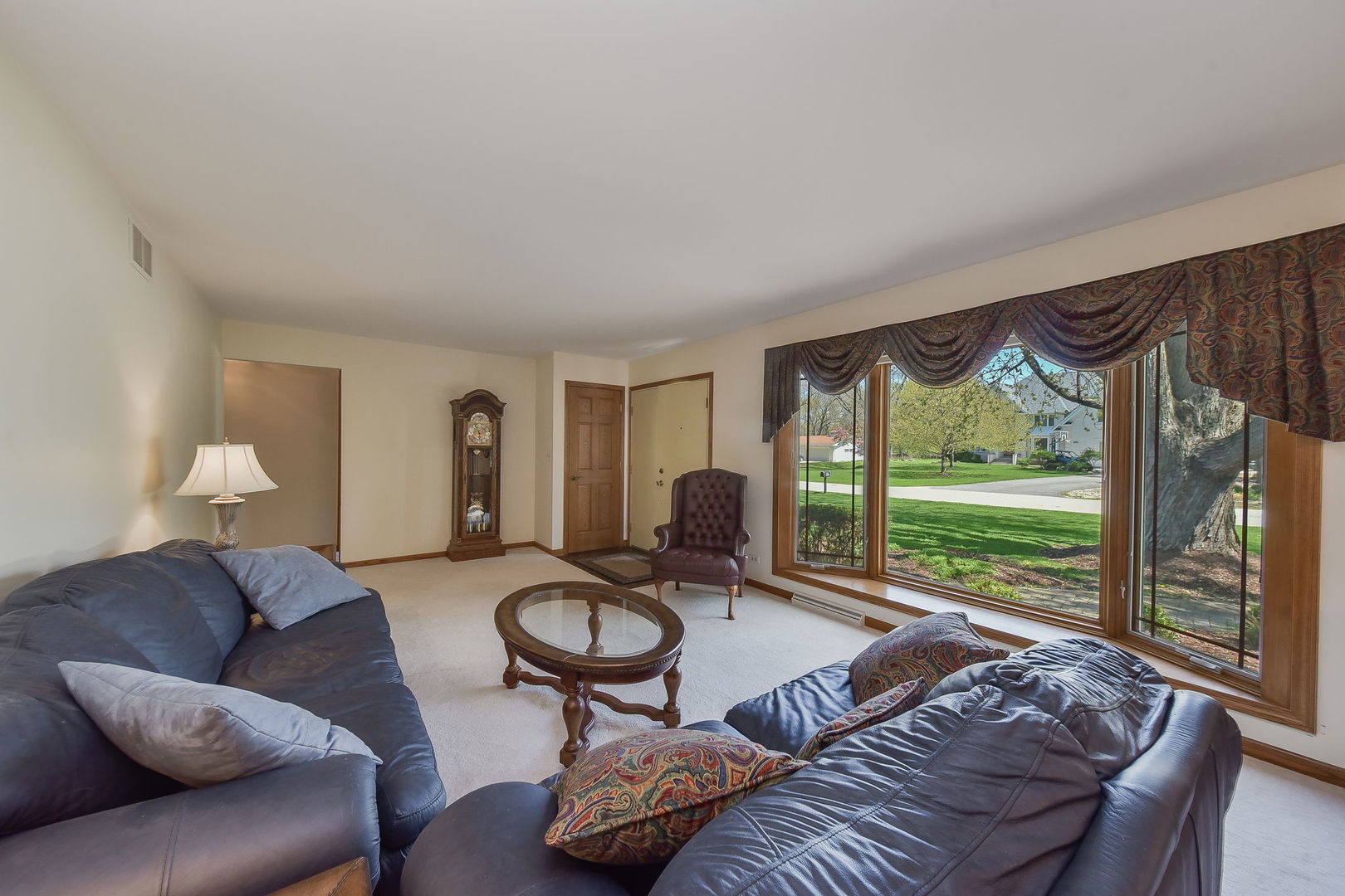 8S526 River Drive Naperville, IL 60565 - Photo 3 of 35 a living room with furniture and a large window