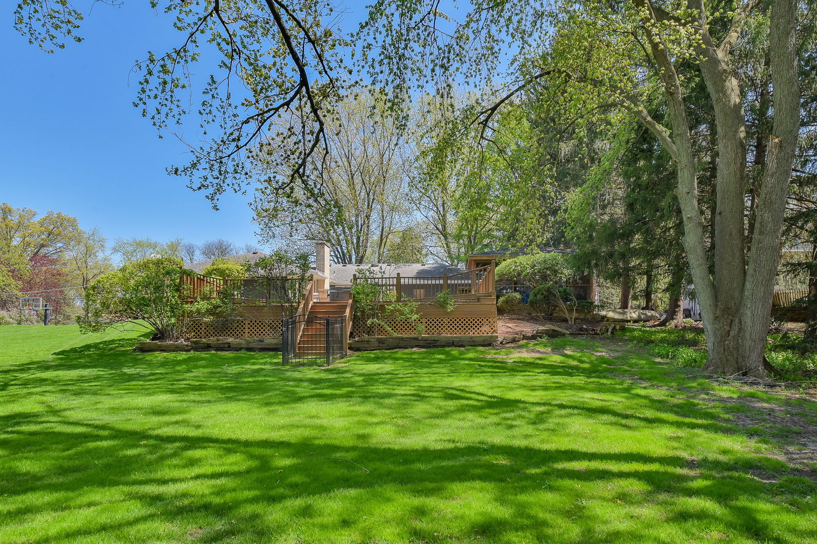 8S526 River Drive Naperville, IL 60565 - Photo 32 of 35 a view of a backyard with large trees