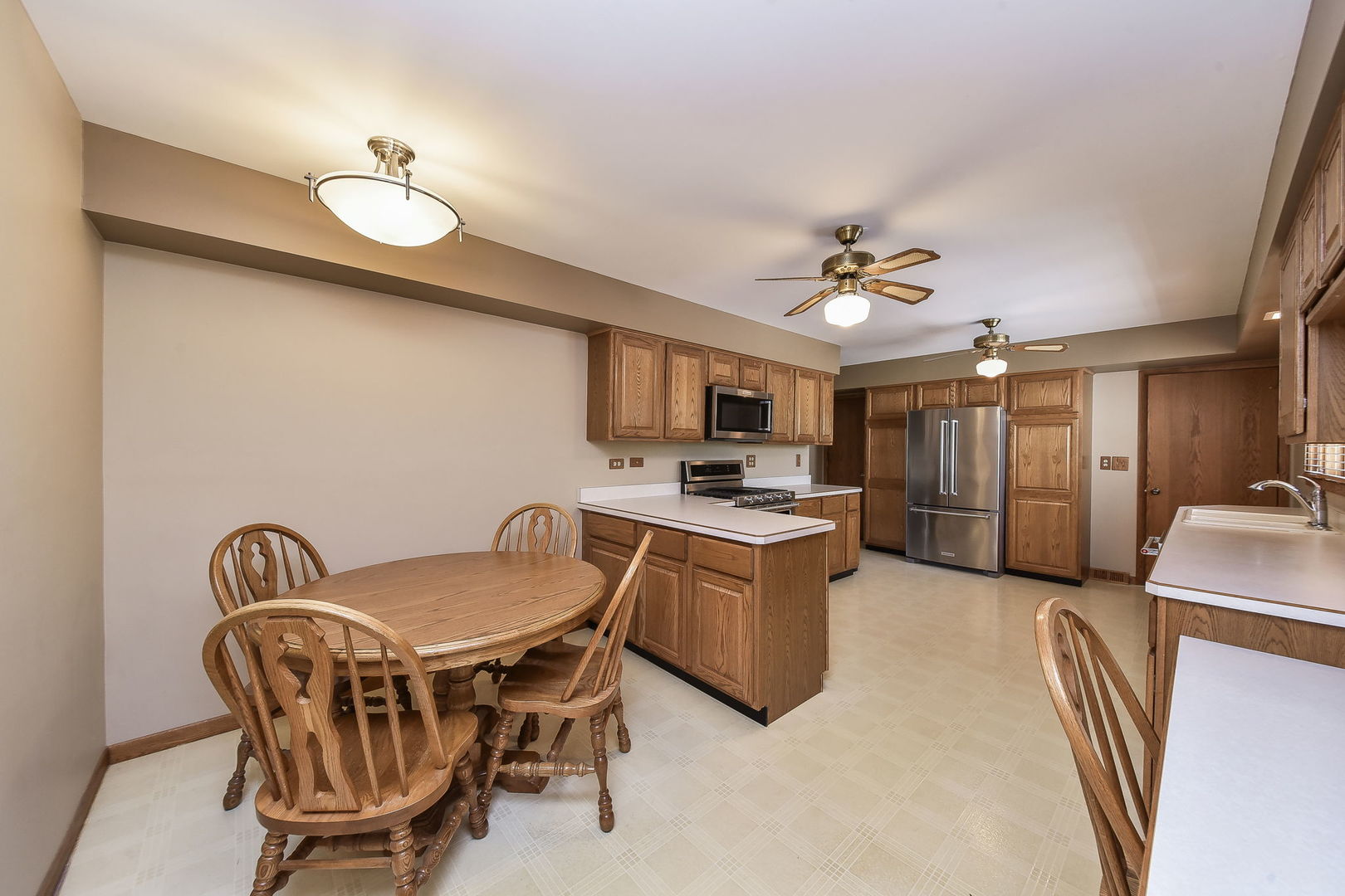 8S526 River Drive Naperville, IL 60565 - Photo 5 of 35 a view of a dining room with furniture