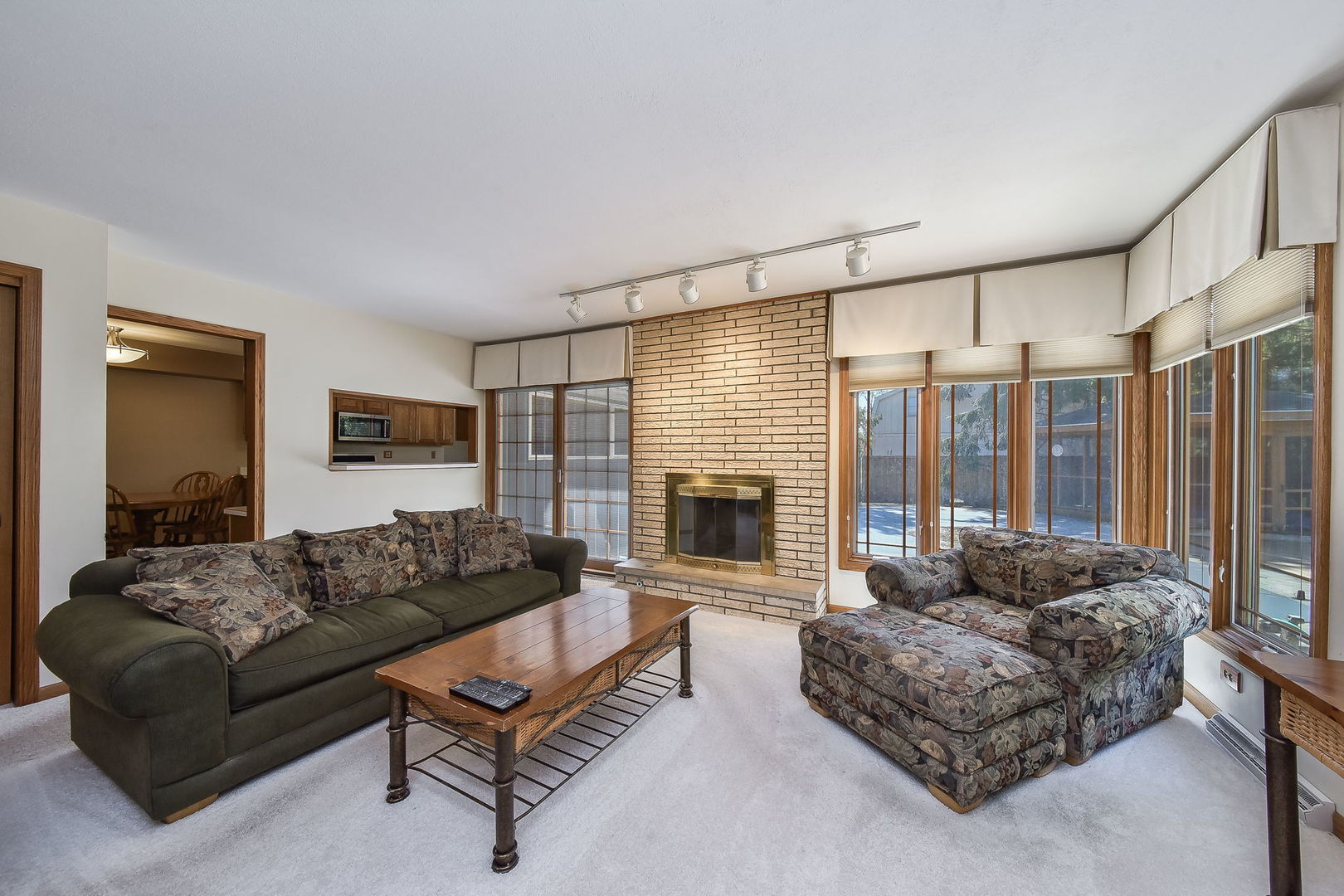 8S526 River Drive Naperville, IL 60565 - Photo 9 of 35 a living room with furniture and a fireplace