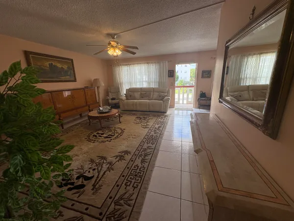 a lobby with furniture and window