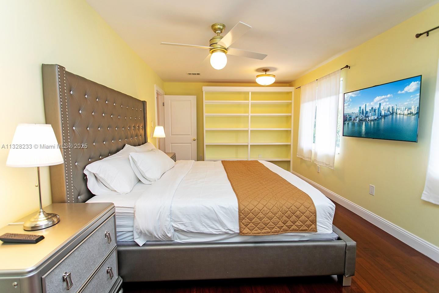 809 South 17th Avenue Hollywood, FL 33020 - Photo 18 of 45 a bed room with a bed and a night stand
