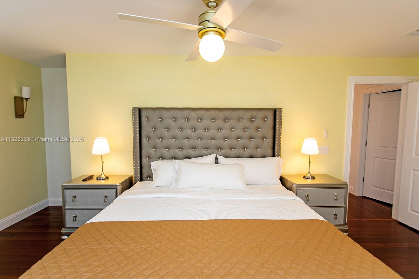809 South 17th Avenue Hollywood, FL 33020 - Photo 20 of 45 a bedroom with a bed and a lamp