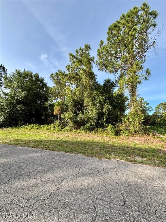 5051 Tradewinds Circle LaBelle, FL 33935 - Photo 2 of 4 a view of a yard with a house