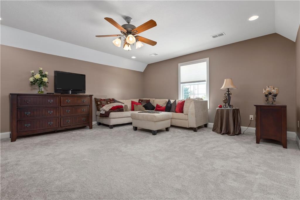 121 Bell Court Road McKees Rocks, PA 15136 - Photo 22 of 25 a living room with furniture and a flat screen tv