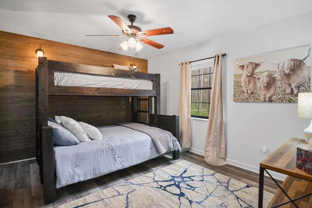 45 Wilderness Trail Blue Ridge, GA 30513 - Photo 22 of 52 a bedroom with a bed and a window