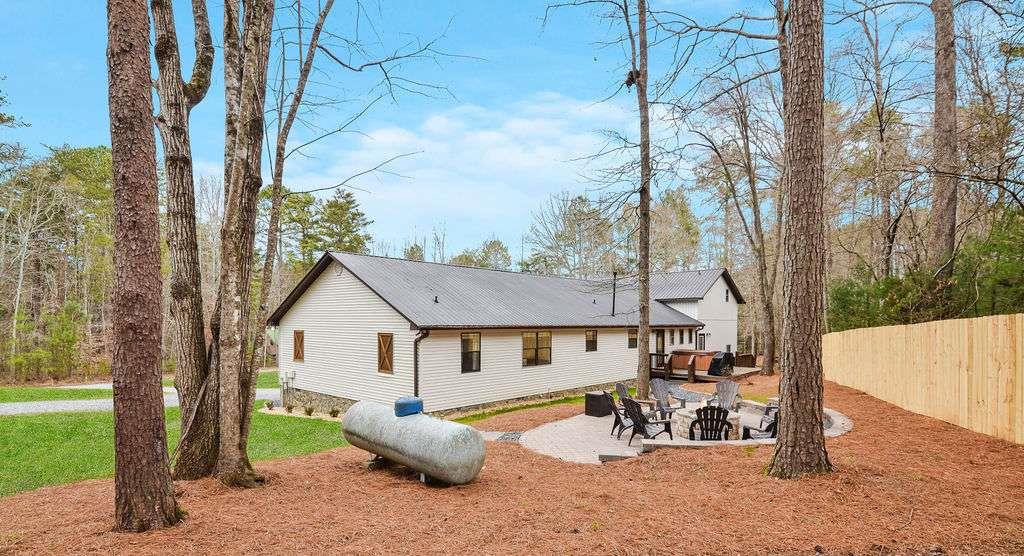 45 Wilderness Trail Blue Ridge, GA 30513 - Photo 5 of 52 a view of a white house with a patio