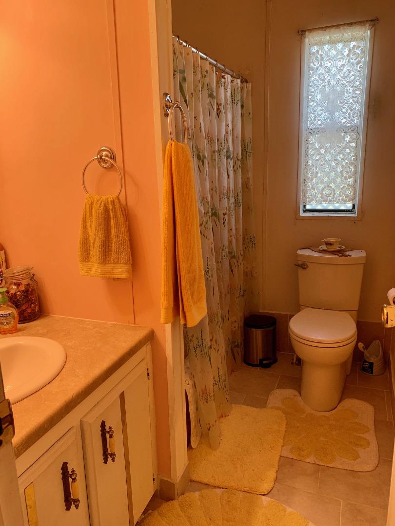 73856 Copperhead Road Bradley, CA 93426 - Photo 23 of 23 a bathroom with a toilet and shower