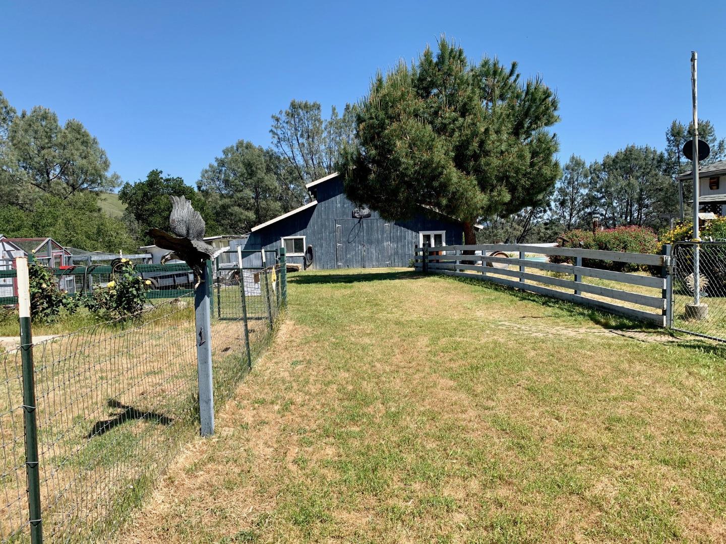 73856 Copperhead Road Bradley, CA 93426 - Photo 8 of 23 a swimming pool with trees in the background