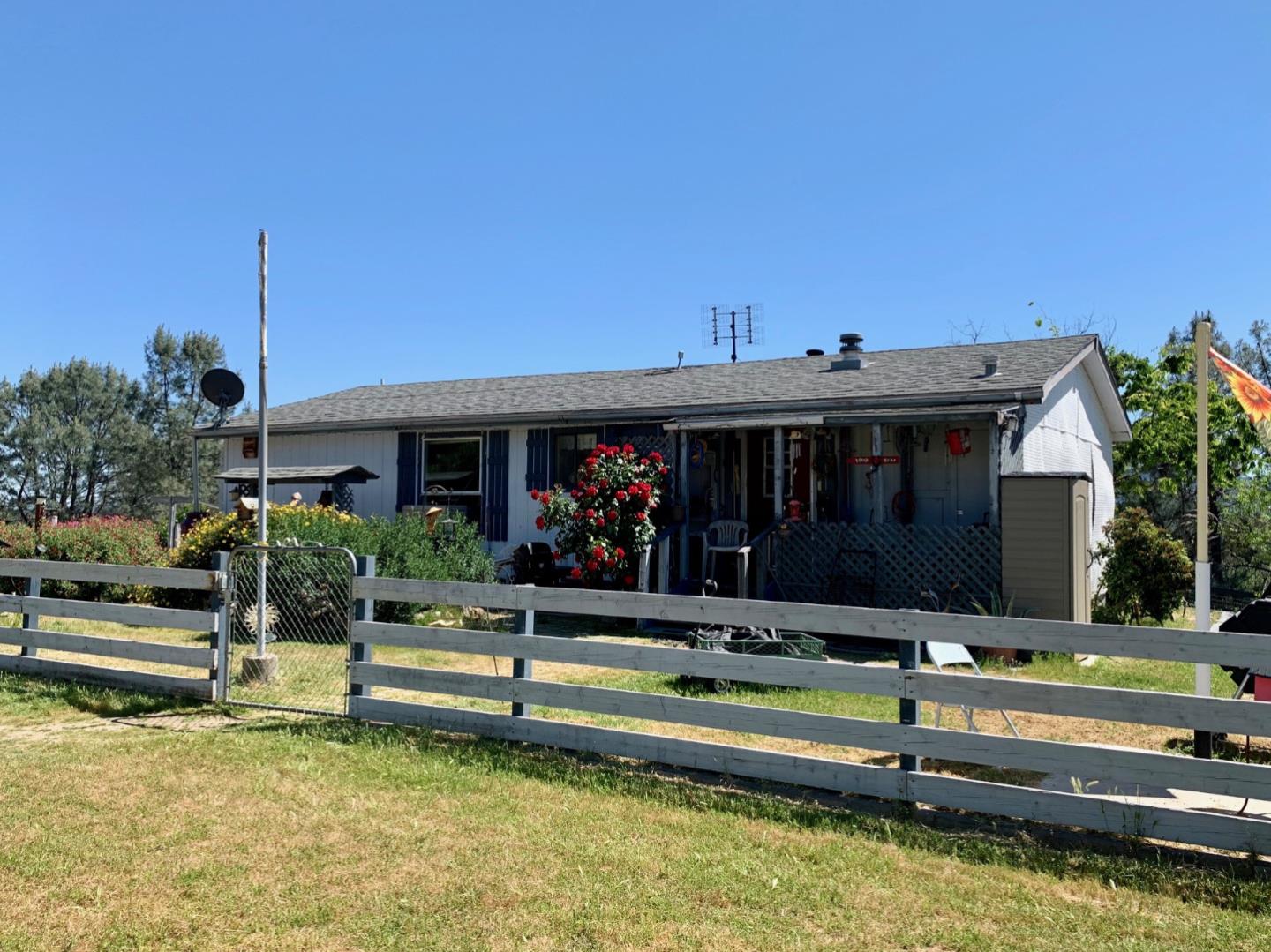 73856 Copperhead Road Bradley, CA 93426 - Photo 9 of 23 a view of house with swimming pool and a yard with some potted plants