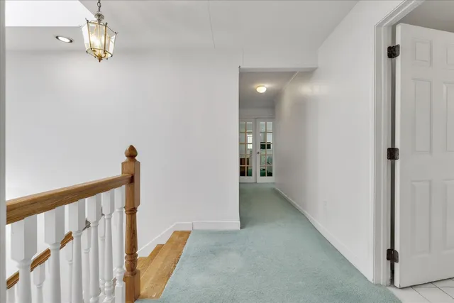 a view of a hallway with entryway