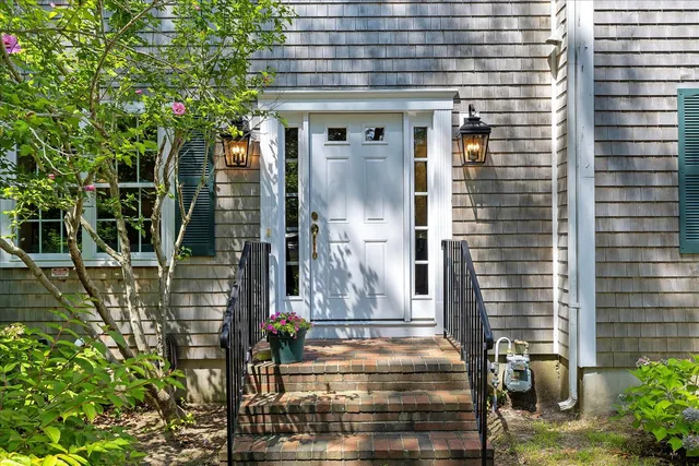 a front view of a house with outdoor space