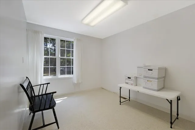 a room with furniture and windows